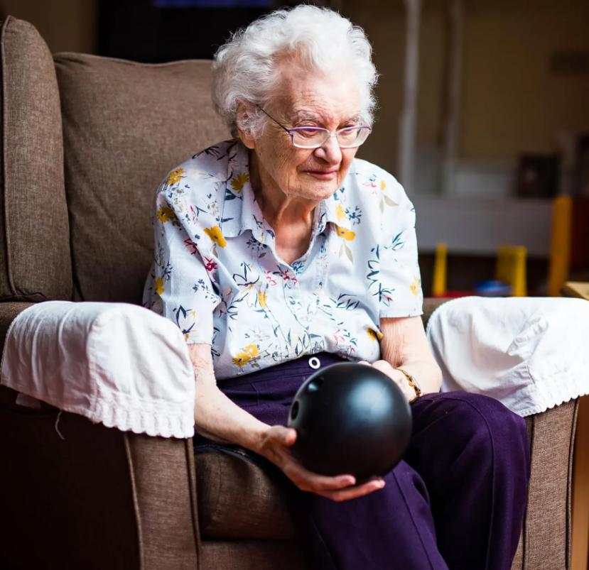 resident with bowling ball